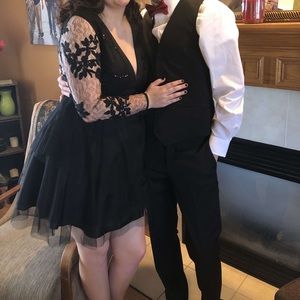 Black long sleeved formal dress